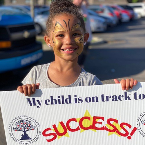 Par-Kid-with-Sign